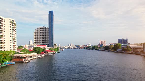 4K UHD : Bangkok River drone view. Flying over the Chao Phraya River