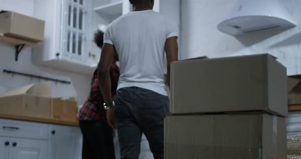 Young Couple Moving in Their New Home