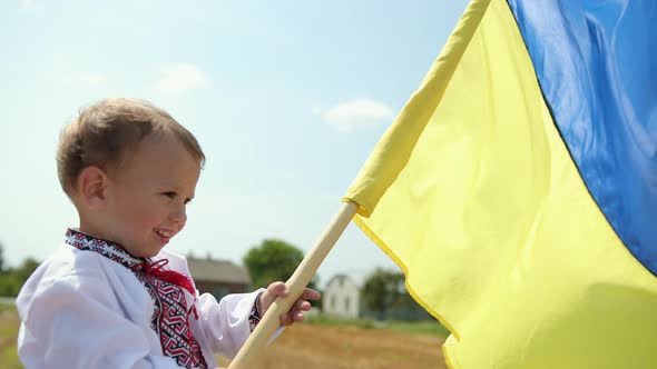 Son Waving Ukrainian Flag on Wheat Field Lonely Patriot Man Standing Ukraine