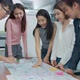 Group of asian creative employee standing and brainstorming stategy plan - VideoHive Item for Sale