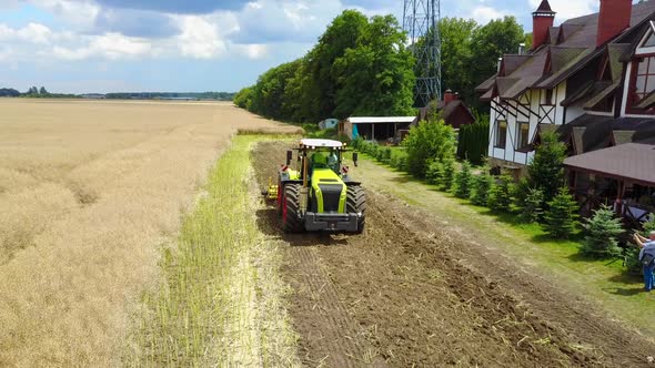 Tractor Working in the Agricultural Field