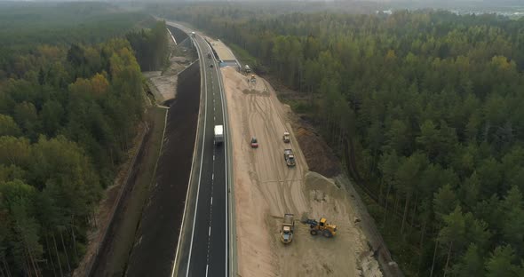 Road Construction Aerial View Heavy Machinery Building New Highway in Nature