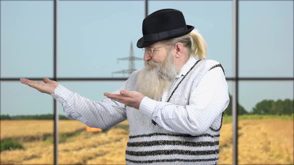 Senior Farmer Showing Copy Space with Hands