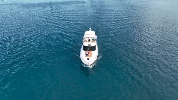 A couple rides a yacht aerial view 4 K Turkey Alanya