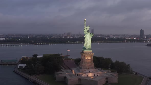 Circling Statue of Liberty Beautifully Illuminated in Early Morning Light New York City