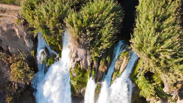 Top View of a High Waterfall Falling Into the Mediterranean Sea. Clean Ecology 