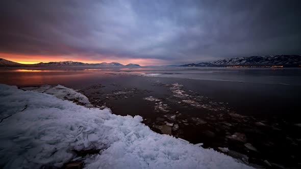 Sunrise Over Lake as the Ice is Melting