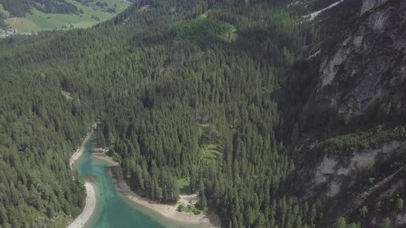 Aerial view of lake Braies lago di Braies in Dolomites mountains European Alps forest hillside Italy