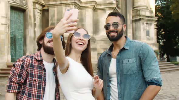Multiethnic Friends Making Selfie Outdoors