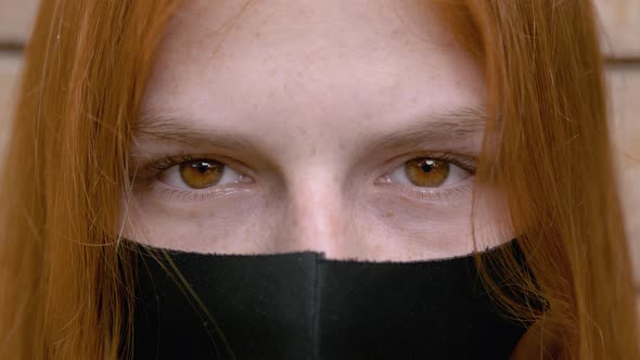 Close Up Portrait of Young Woman in Face Mask