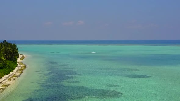 Aerial drone tourism of lagoon beach break by ocean with sand background