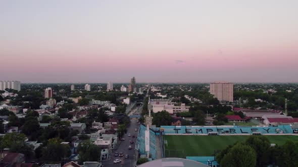 Air flight over the city, football stadium.