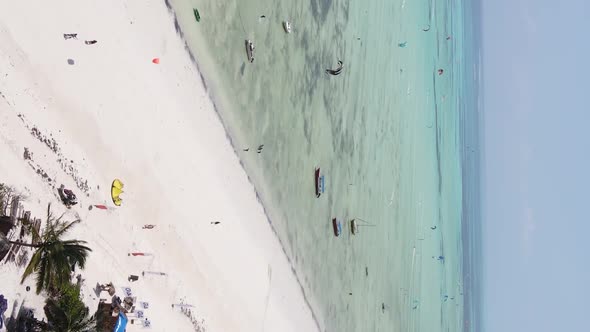 Vertical Video of the Ocean Near the Coast of Zanzibar Tanzania Aerial View