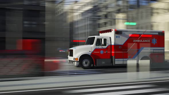 Fast ambulance truck driving through a city downtown with red signals on. 4KHD