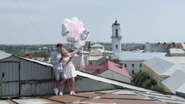 Couple relaxing on a rooftop