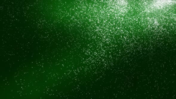 White and grey animated dust particles on a dark green background with light highlights. Background