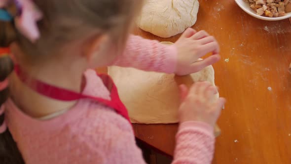 Little Girl Rolling Dough Pizza