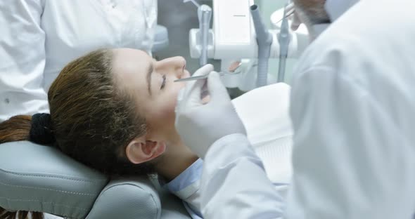Dentist Doing Teeth Examination