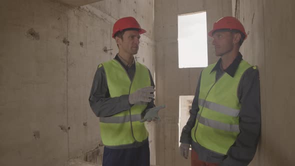 Workers in Frame of Panel Building