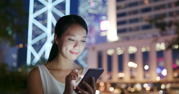 Woman Use of Mobile Phone for Online