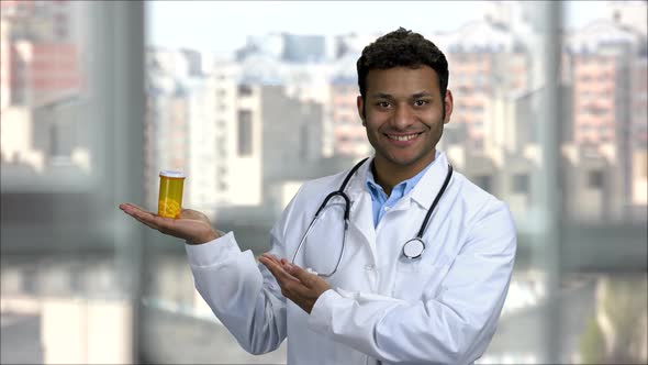 Happy Hindu Doctor Advertising Can of Pills