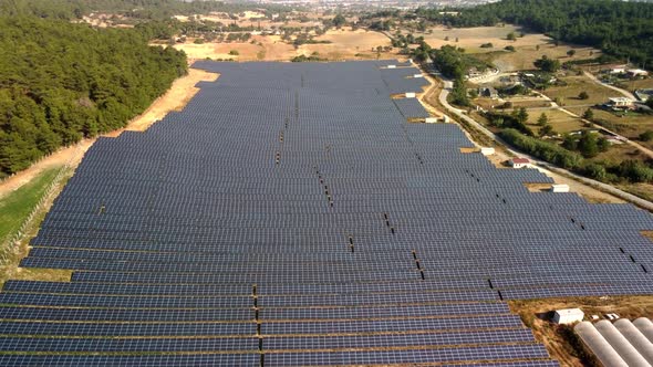 Aerial View of a Solar Farm on the Green Field