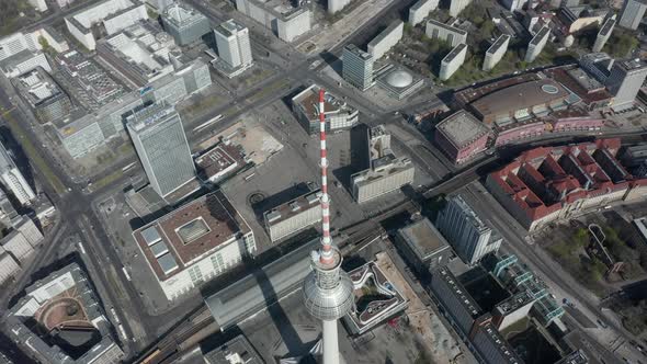 AERIAL: Close View of Alexanderplatz TV Tower in Empty Berlin, Germany with No People or Cars on