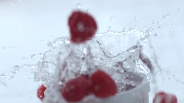 Raspberries splashing in slow motion; shot on Phantom Flex 4K at 1000 fps alt