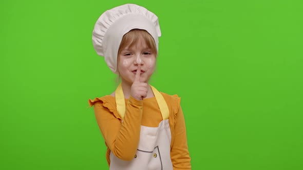 Child Girl Kid Dressed As Cook Chef Holding Finger on Her Lips on Chroma Key Gesture Hush Secret