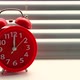 Red alarm clock rang at twelve clock, standing windowsill. - VideoHive Item for Sale