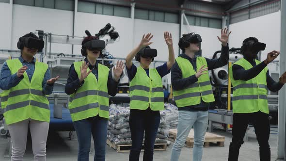 Team of engineers having simulation experience with futuristic virtual reality glasses