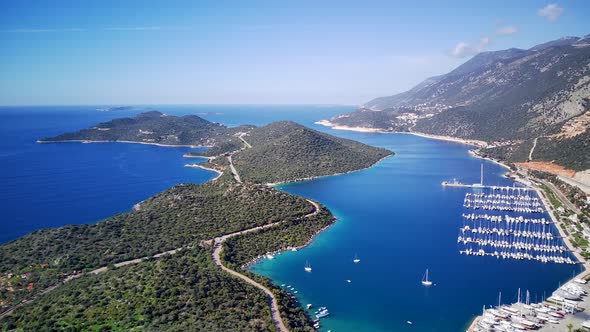 The top view from the drone of Kas resorts, bay, yahts, city in Mugla in Turkey