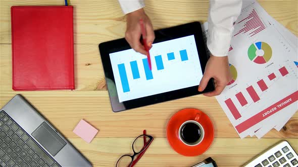 Trader Woman Using Touch Pad