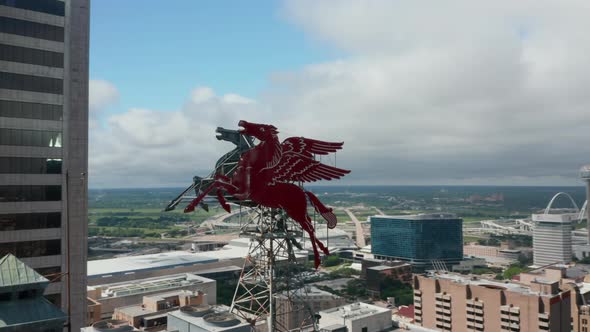Drone Aerial View of Pegasus on Roof of Magnolia Building