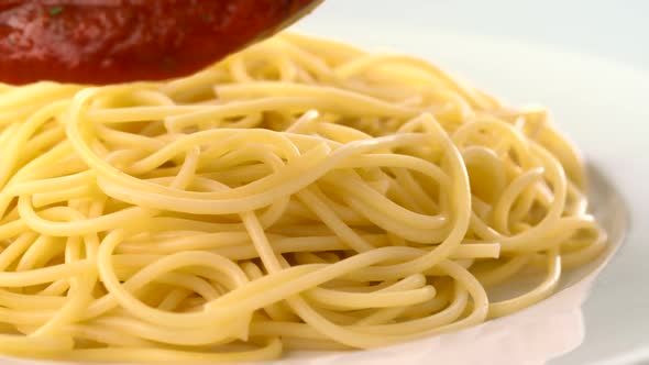 Putting tomato sauce on spaghetti, Slow Motion