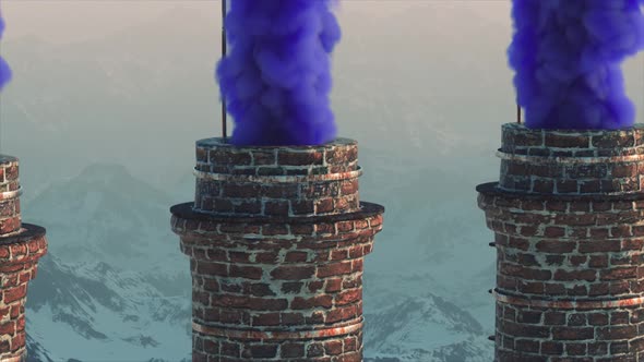 Brick Chimney on the Against the Backdrop of a Snowy Mountain Landscape
