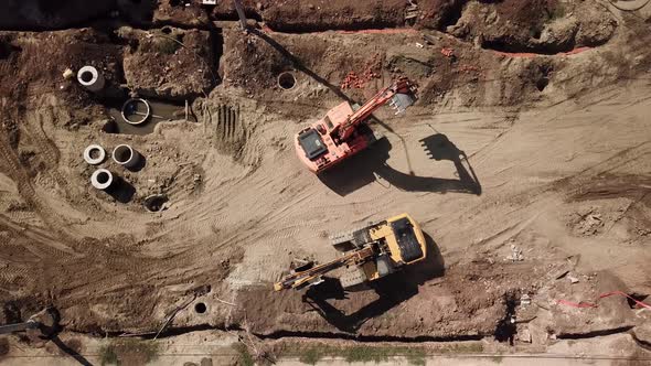 Aerial Construction Site with Machinery, Bulldozer, Excavation. alt