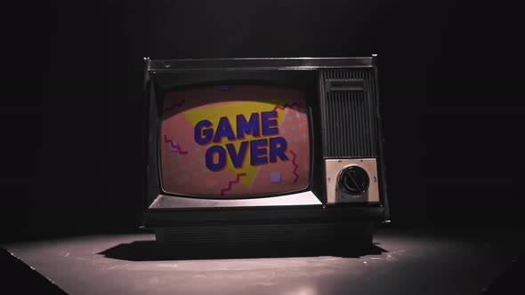 GAME OVER Title on a Tube TV Vintage 80's 90's Arcade. Zooming Out with Fog Giving a Retro Look