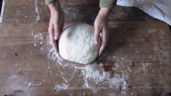 woman in his house Prepares Fresh Bread Cakes Knead Dough Balls Recipe