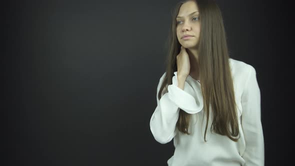 Brunette with Long Loose Flowing Hair Poses for Photo Shoot