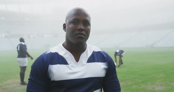 Male rugby player standing in stadium