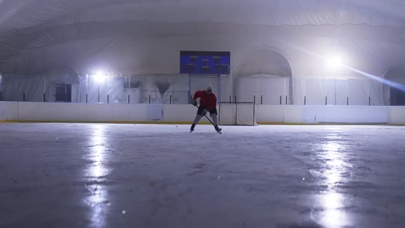 Silhouette Ice Arena Hockey Player