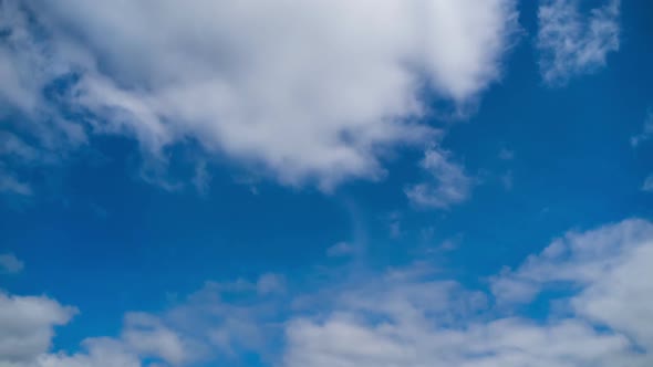 Clouds Move Smoothly in the Blue Sky. Timelapse