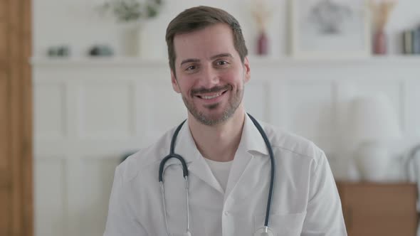 Portrait of Young Doctor Smiling at Camera