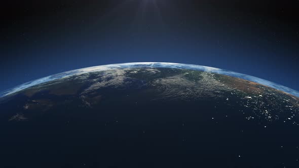 Star sunrise over earth in space. alt