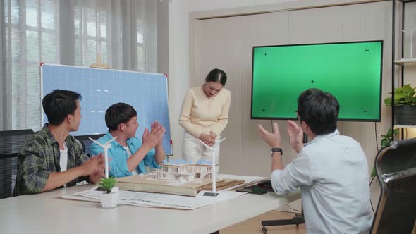 Woman Engineer With Solar Cell Succeed Presenting About The Green Screen TV, Audience Clapping Hands