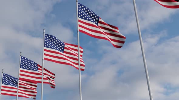 Waving Flags Of The United States and blue sky