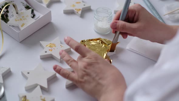 Applying Gold Leaf