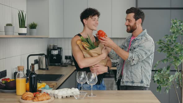 Loving Lgbt Couple of Men Came From the Grocery Store to Home with Shopping and are Going to Cook