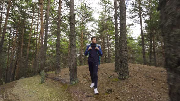 Sporty young man hiking, trekking.